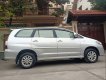 Toyota Innova   2.0E 2014 - Bán ô tô Toyota Innova 2.0E đời 2014, màu bạc chính chủ