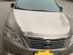 Toyota Camry   2.0E 2015 - Chính chủ bán xe Toyota Camry 2.0E đời 2015, màu vàng cát