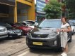 Kia Sedona 2.4 AT  2016 - Cần bán Kia Sedona 2.4 AT đời 2016, màu nâu, 715 triệu