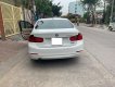 BMW 3 Series 320i 2014 - Cần bán xe BMW 320i 2014 ĐK 2015, số tự động màu trắng