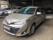 Toyota Vios 1.5AT 2018 - Bán xe Toyota Vios 1.5AT sản xuất năm 2018, màu vàng số tự động