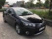 Toyota Corolla altis 2014 - Cần bán xe Toyota Corolla altis sản xuất năm 2014, màu đen