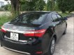 Toyota Corolla altis 2014 - Cần bán xe Toyota Corolla altis sản xuất năm 2014, màu đen