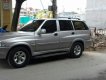 Ssangyong Musso 2.4AT 2004 - Cần bán xe Ssangyong Musso 2.4AT 2004, màu bạc