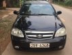 Daewoo Lacetti    MT 2004 - Cần bán gấp Daewoo Lacetti MT năm 2004, màu đen, xe rất đẹp