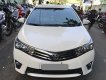 Toyota Corolla altis MT 2015 - Gia đình cần bán xe Altis 2015, số sàn, màu trắng, gia đình sử dụng