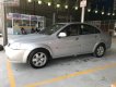 Daewoo Lacetti Max 1.8 MT 2004 - Cần bán lại xe Daewoo Lacetti Max 1.8 MT sản xuất 2004, màu bạc