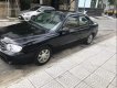 Kia Spectra   2004 - Bán xe Kia Spectra đời 2004, màu đen, nhập khẩu