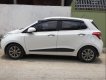 Hyundai Grand i10  1.0AT 2015 - Bán xe Hyundai Grand i10 đời 2015, màu trắng, nhập khẩu  