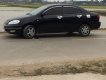 Toyota Corolla 2002 - Bán ô tô Toyota Corolla sản xuất 2002, màu đen