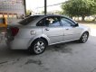Daewoo Lacetti Max 1.8 MT 2004 - Cần bán lại xe Daewoo Lacetti Max 1.8 MT sản xuất 2004, màu bạc