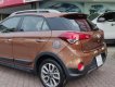 Hyundai i20 Active 1.4 AT 2015 - Bán xe Hyundai i20 Active 1.4 AT sản xuất 2015, màu nâu, nhập khẩu