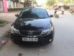 Kia Cerato LX 2009 - Bán xe Kia Cerato 2009, màu đen, tại Hà Nội