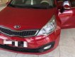 Kia Rio 2014 - Cần bán gấp Kia Rio sản xuất 2014, màu đỏ, nhập khẩu nguyên chiếc xe gia đình