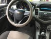 Chevrolet Cruze 2010 - Gia đình cần bán Cruze 2010, số sàn, màu vàng cát