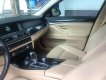 BMW 5 Series 520i 2.0AT 2014 - Chính chủ bán BMW 520i màu trắng kem SX 2015, cửa hít, màn NBT, loa Harman