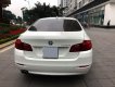 BMW 5 Series 520i 2.0AT 2014 - Chính chủ bán BMW 520i màu trắng kem SX 2015, cửa hít, màn NBT, loa Harman