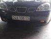 Daewoo Lacetti  MT 2004 - Bán Daewoo Lacetti MT năm sản xuất 2004, màu đen, máy 1.6 ít xăng