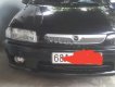 Mazda 323 GLXi 1.6 MT 1999 - Bán ô tô Mazda 323 GLXi 1.6 MT 1999, màu đen, xe đã qua sử dụng nhưng mọi chức năng đều tốt