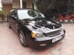 Daewoo Magnus 2004 - Cần bán Daewoo Magnus đời 2004, màu đen, giá 119tr