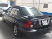 Ford Laser GHIA 1.8 2002 - Bán Ford Laser GHIA 1.8 đời 2004, màu xám (ghi), nhập khẩu nguyên chiếc