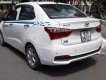 Hyundai Grand i10   2017 - Chính chủ bán xe Hyundai Grand i10 sản xuất năm 2017, màu trắng, bản full options