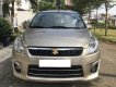 Suzuki Ertiga 2014 - Cần bán xe Suzuki Eartiga 2014 số tự động 7 chỗ, màu vàng cát