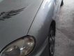 Daewoo Lanos SX 2004 - Cần bán xe Daewoo Lanos SX năm 2004, màu bạc