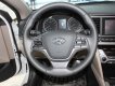 Hyundai Elantra 1.6AT 2018 - Bán Hyundai Elantra 1.6AT năm 2018, màu trắng, lướt odo 9000 km