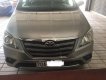 Toyota Innova E 2014 - Cần bán xe Toyota Innova E năm 2014, màu bạc, còn rất đẹp