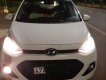 Hyundai Grand i10 2015 - Chính chủ bán xe Hyundai Grand i10 năm 2015, màu trắng, xe nhập