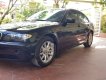 BMW 3 Series 318i 2003 - Bán BMW 318i đời 2003, màu đen, số tự động 