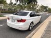 BMW 3 Series  320i 2014 - Cần bán xe BMW 3 Series 320i năm sản xuất 2014, màu trắng, giá chỉ 860 triệu