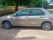 Mitsubishi Lancer 2003 - Bán Mitsubishi Lancer sản xuất năm 2003, màu vàng, nhập khẩu