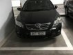 Toyota Corolla altis   2009 - Bán xe Toyota Corolla altis sản xuất năm 2009, màu đen đã đi 200.000 km