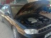Kia Spectra   2004 - Bán Kia Spectra đời 2004, màu đen, nhập khẩu
