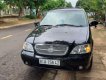 Kia Carnival 2006 - Bán ô tô Kia Carnival sản xuất năm 2006, màu đen, nhập khẩu nguyên chiếc