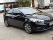 Kia K3   1.6AT 2014 - Nhu cầu đổi xe 7 chỗ nên bán Kia K3 1.6AT 2014