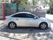 Chevrolet Cruze   2011 - Bán Chevrolet Cruze sản xuất năm 2011, màu bạc, xe gia đình