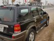 Ford Escape 2003 - Bán ô tô Ford Escape năm 2003, màu đen số sàn