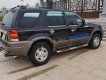 Ford Escape 2003 - Bán ô tô Ford Escape năm 2003, màu đen số sàn