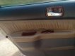 Mitsubishi Lancer 2004 - Gia đình bán xe Mitsubishi Lancer SX 2004, màu nâu, nhập khẩu