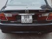 Mazda 323   2000 - Bán Mazda 323 đời 2000, màu đen