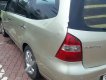 Nissan Grand livina   2011 - Bán Nissan Grand livina đời 2011, màu vàng, số sàn  