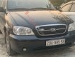 Kia Carnival   2009 - Cần bán Kia Carnival sản xuất năm 2009, màu đen, số tự động