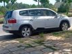 Chevrolet Orlando 2012 - Cần bán gấp Chevrolet Orlando sản xuất 2012, màu bạc