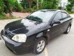 Daewoo Lacetti EX 2005 - Nhà bán Daewoo Lacetti EX đời 2005, màu đen số sàn