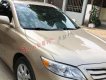 Toyota Camry 2010 - Cần bán gấp Toyota Camry sản xuất 2010, màu vàng