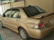 Mitsubishi Lancer 2004 - Cần bán lại xe Mitsubishi Lancer đời 2004, màu vàng xe gia đình, giá chỉ 230 triệu