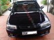 Mazda 323 2000 - Cần bán xe Mazda 323 năm 2000, màu đen chính chủ, giá 70tr